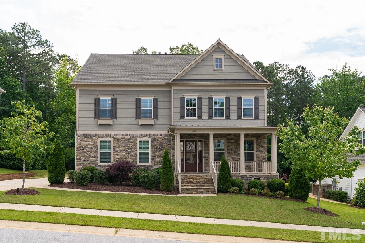 4813 Sunset Fairways Drive Apex, NC 27539 - Photo 1 of 44 a front view of a house with a yard