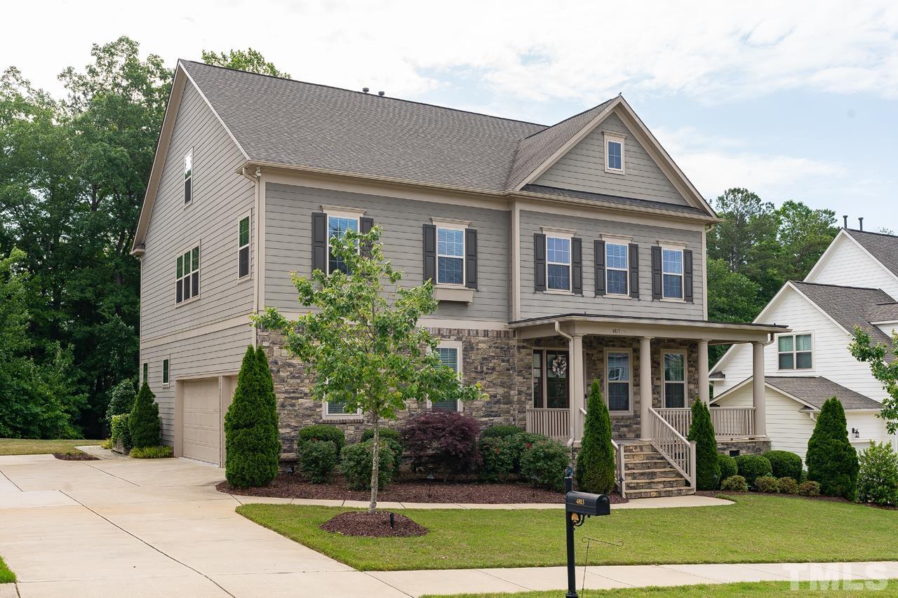 4813 Sunset Fairways Drive Apex, NC 27539 - Photo 2 of 44 a front view of a house with a yard