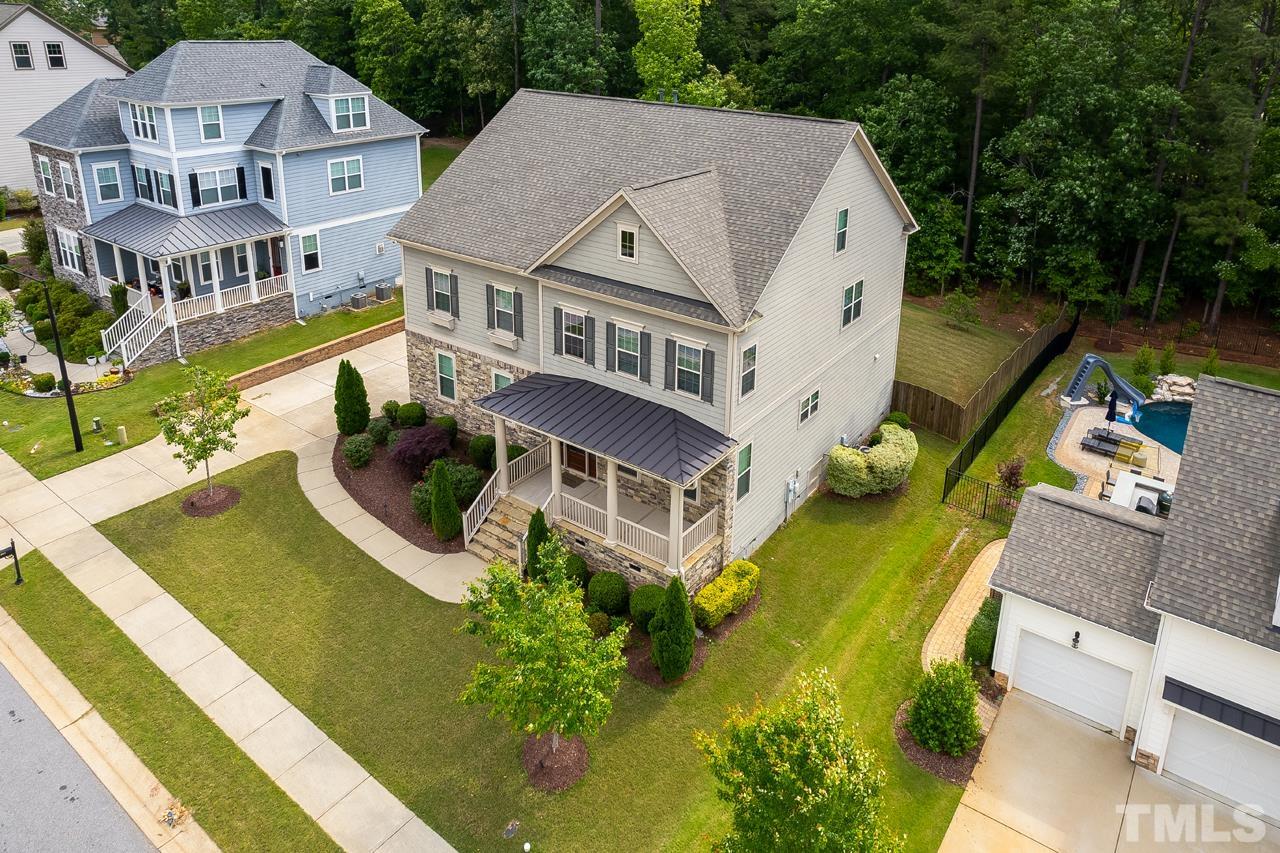 4813 Sunset Fairways Drive Apex, NC 27539 - Photo 3 of 44 an aerial view of a house with a garden