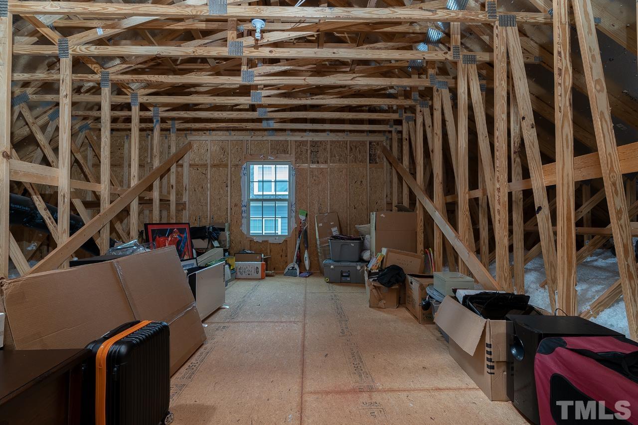 4813 Sunset Fairways Drive Apex, NC 27539 - Photo 37 of 44 a view of living room with furniture and a window