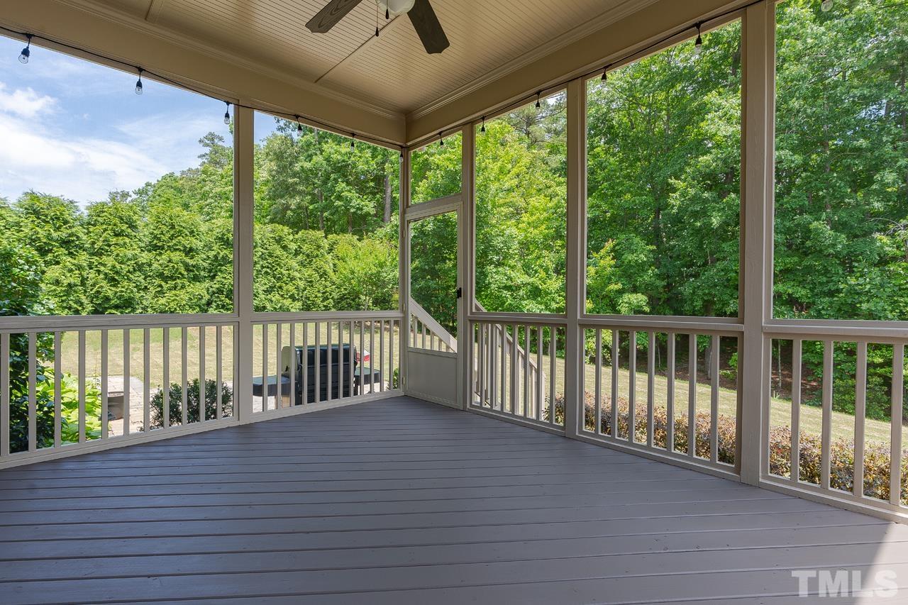 4813 Sunset Fairways Drive Apex, NC 27539 - Photo 40 of 44 a view of a balcony with wooden floor