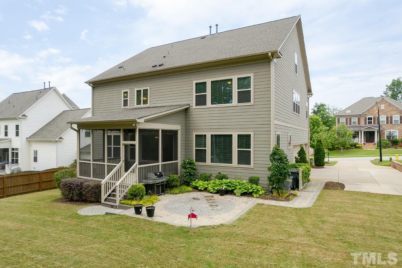 4813 Sunset Fairways Drive Apex, NC 27539 - Photo 41 of 44 a house view with a garden space