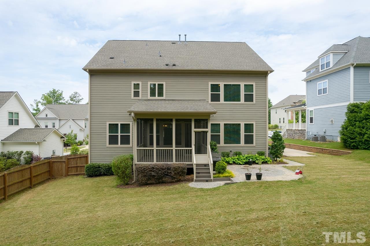 4813 Sunset Fairways Drive Apex, NC 27539 - Photo 42 of 44 a front view of a house with a yard