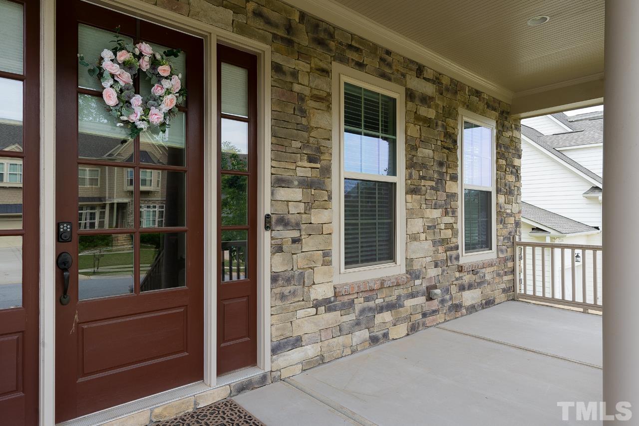 4813 Sunset Fairways Drive Apex, NC 27539 - Photo 5 of 44 a front view of a house with a windows