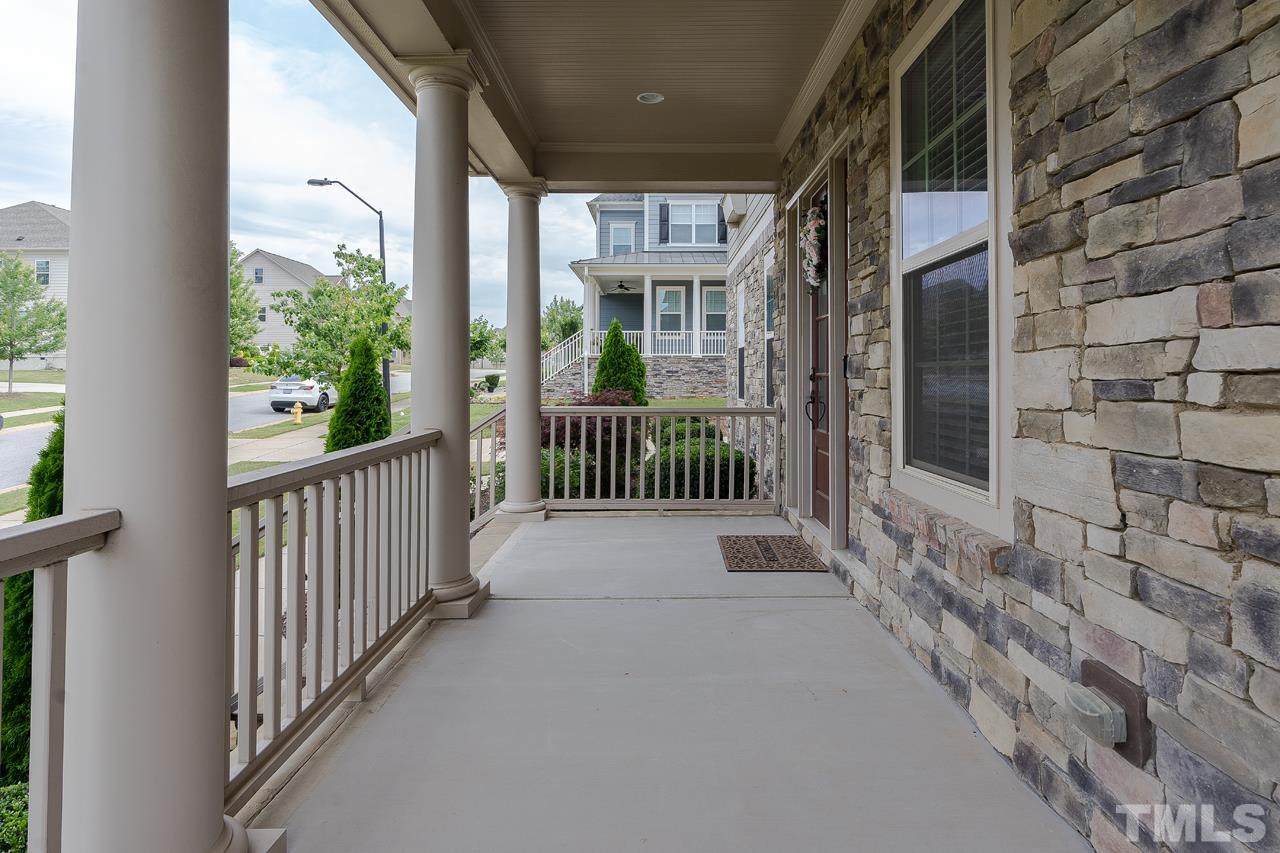4813 Sunset Fairways Drive Apex, NC 27539 - Photo 6 of 44 a view of a balcony with large windows