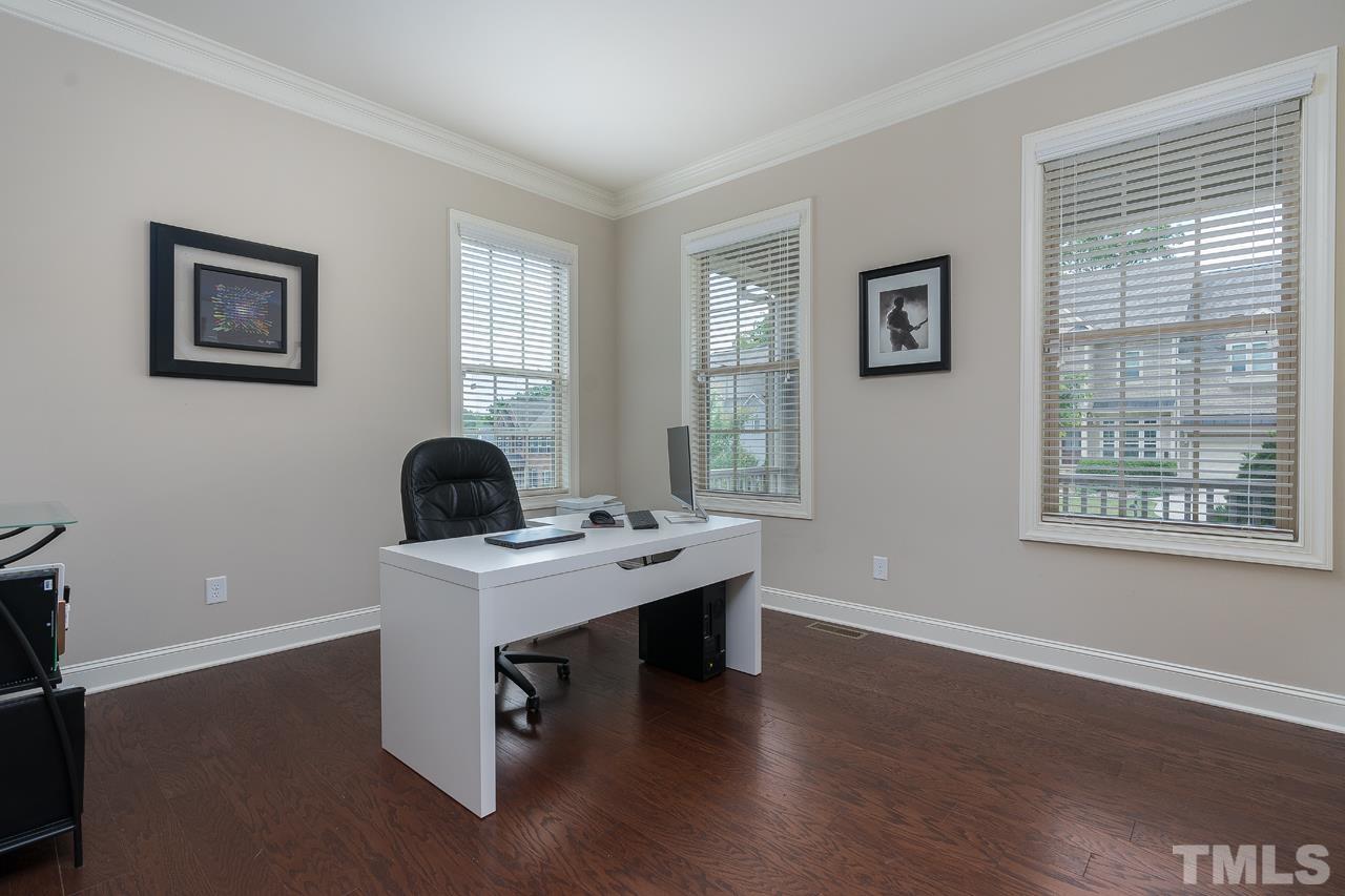 4813 Sunset Fairways Drive Apex, NC 27539 - Photo 8 of 44 a workspace with furniture and window