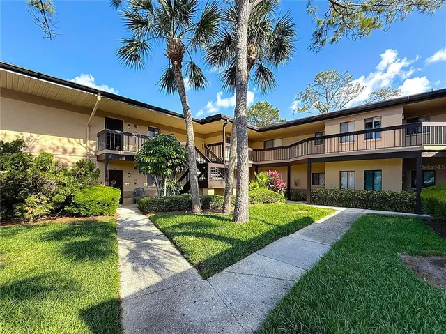 a view of a yard in front of a house
