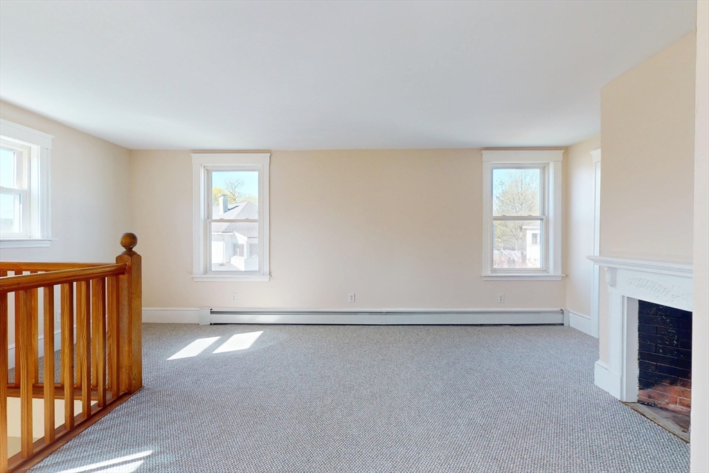 18 Faneuil Road, Unit 18 Waltham, MA 02452 - Photo 11 of 20 an empty room with windows