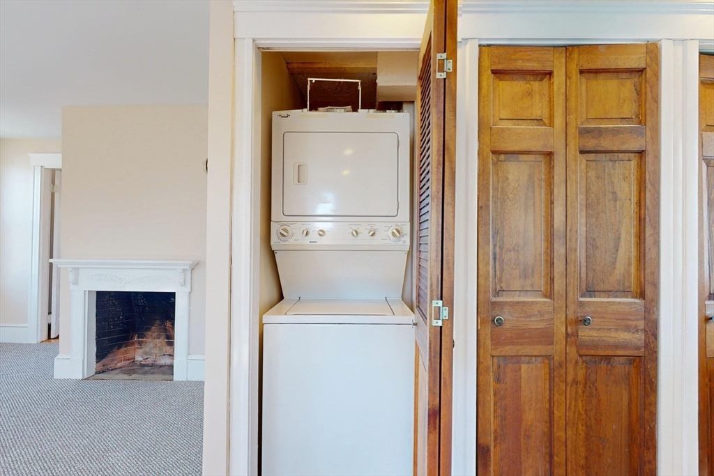 18 Faneuil Road, Unit 18 Waltham, MA 02452 - Photo 16 of 20 a close view of a utility room with dryer and washer