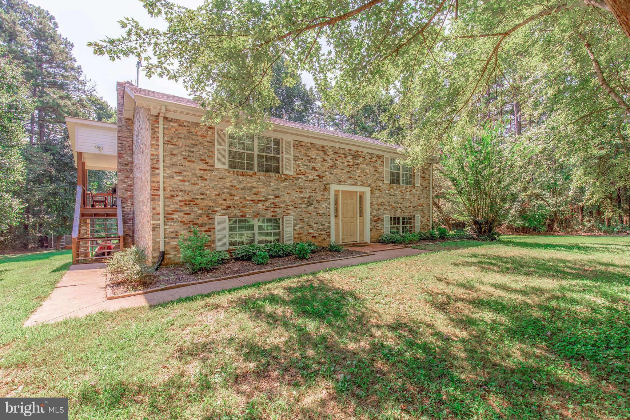 a front view of house with yard