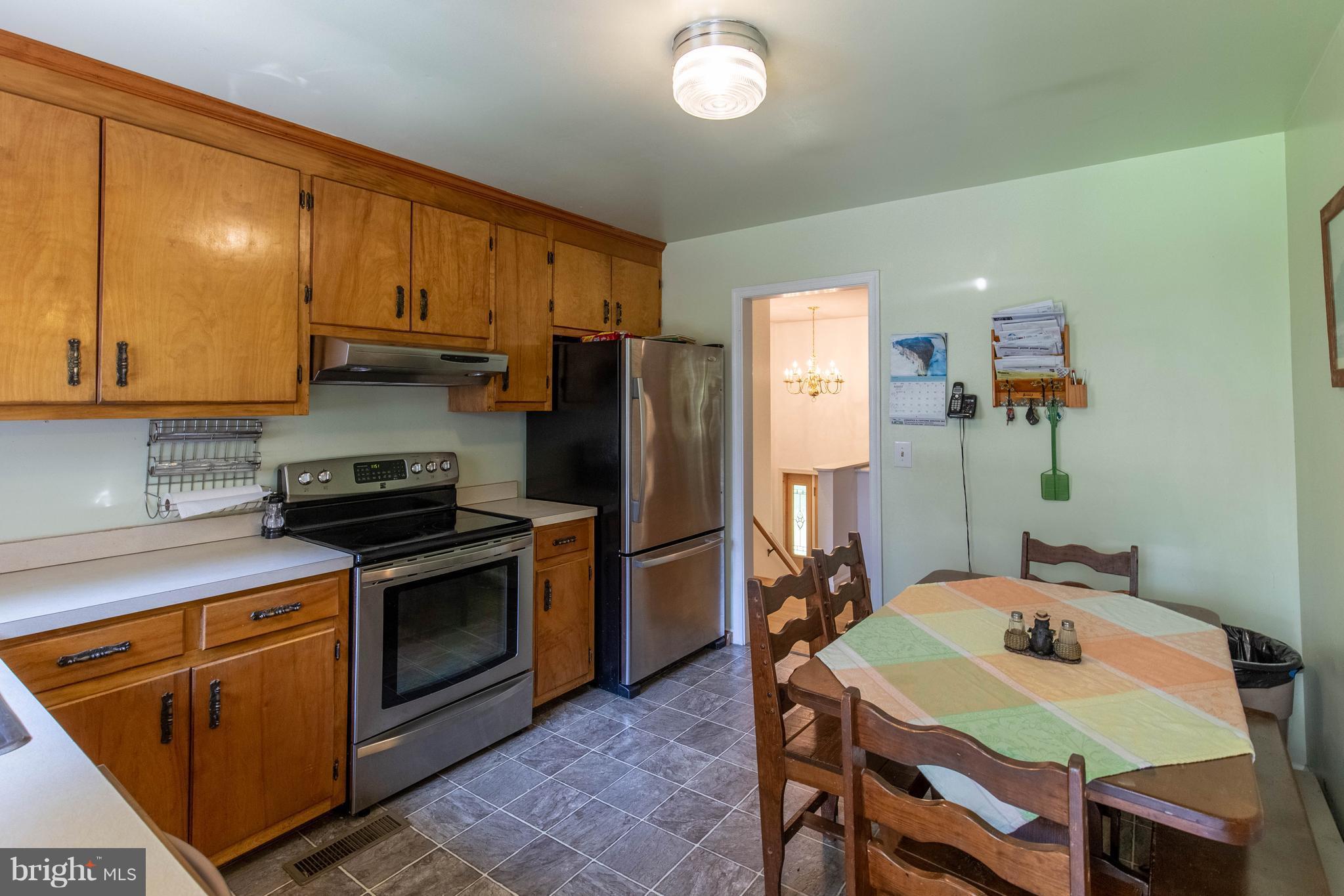 2262 Hanback Road Gordonsville, VA 22942 - Photo 12 of 24 a kitchen that has a table and chairs in it