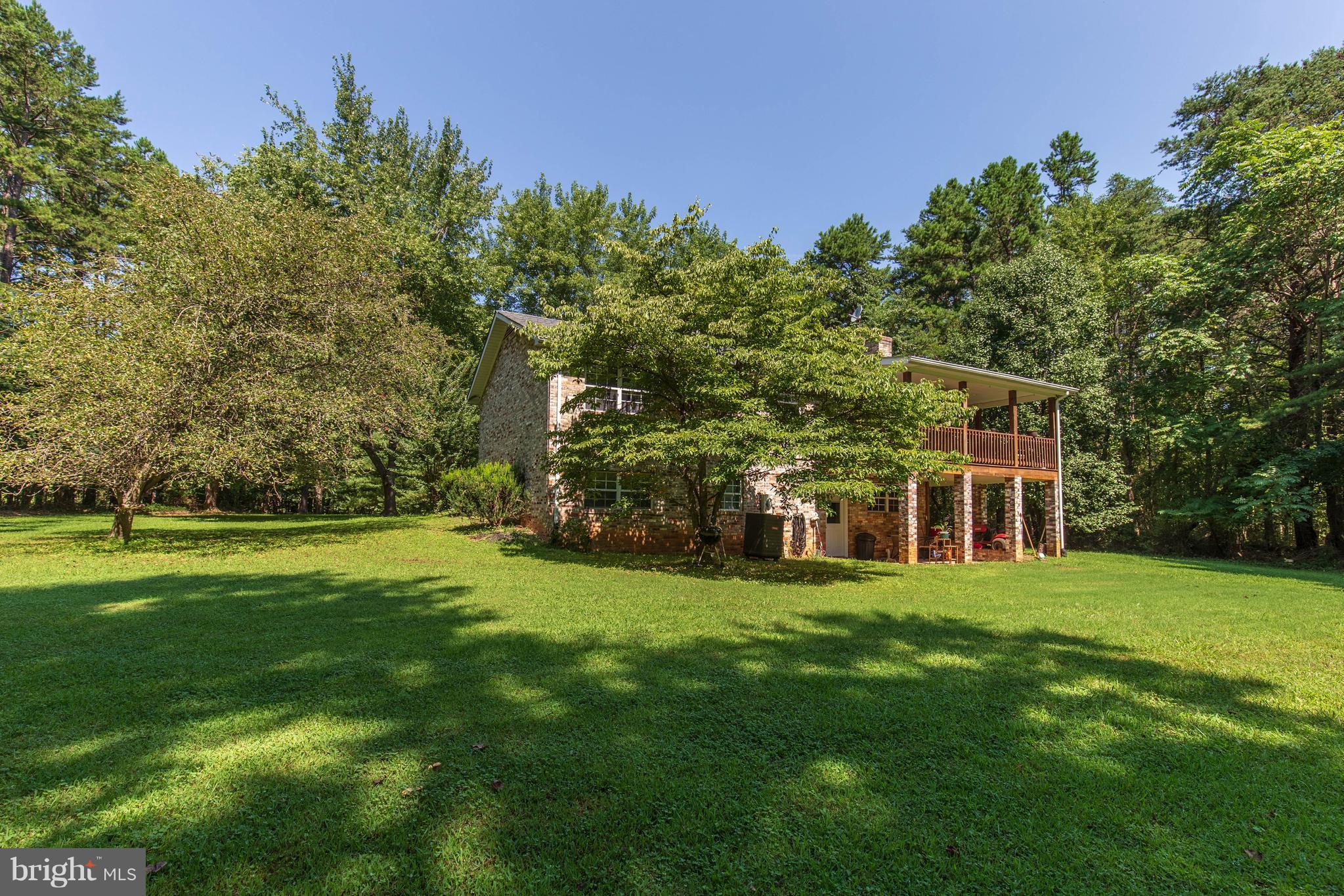 2262 Hanback Road Gordonsville, VA 22942 - Photo 4 of 24 a view of a house with a big yard