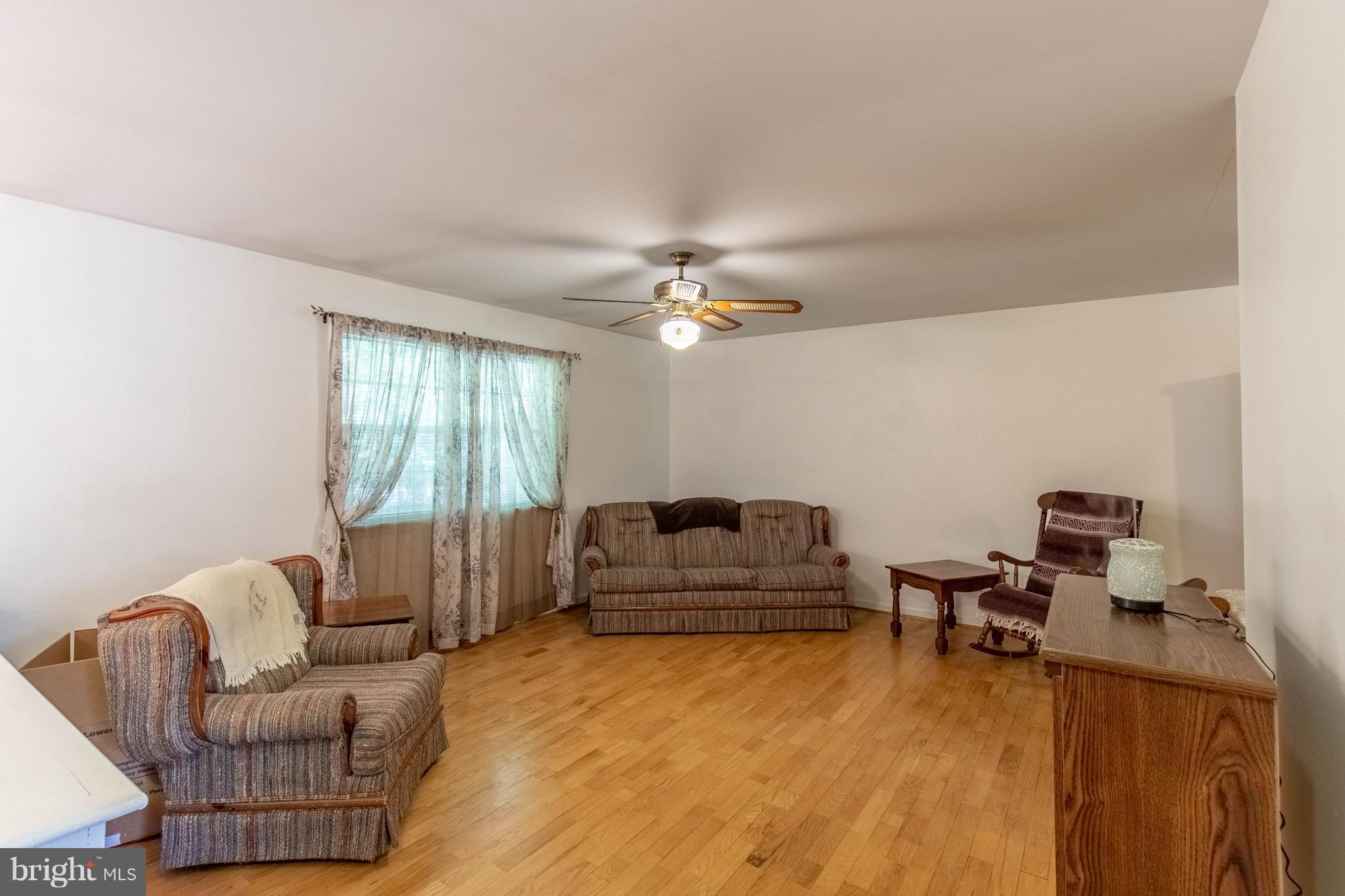 2262 Hanback Road Gordonsville, VA 22942 - Photo 8 of 24 a living room with furniture and a large window