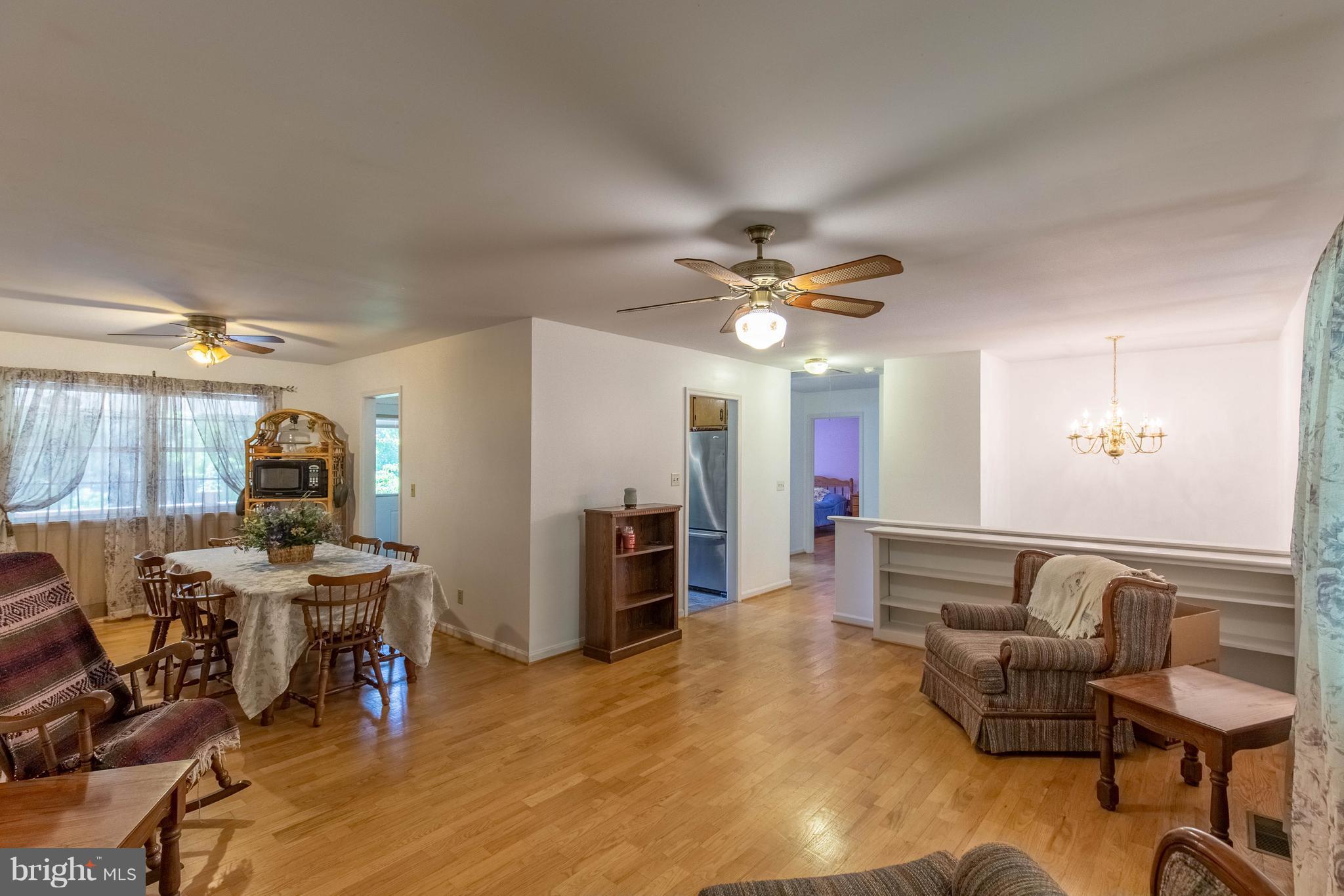 2262 Hanback Road Gordonsville, VA 22942 - Photo 9 of 24 a view of a livingroom with furniture and chandelier