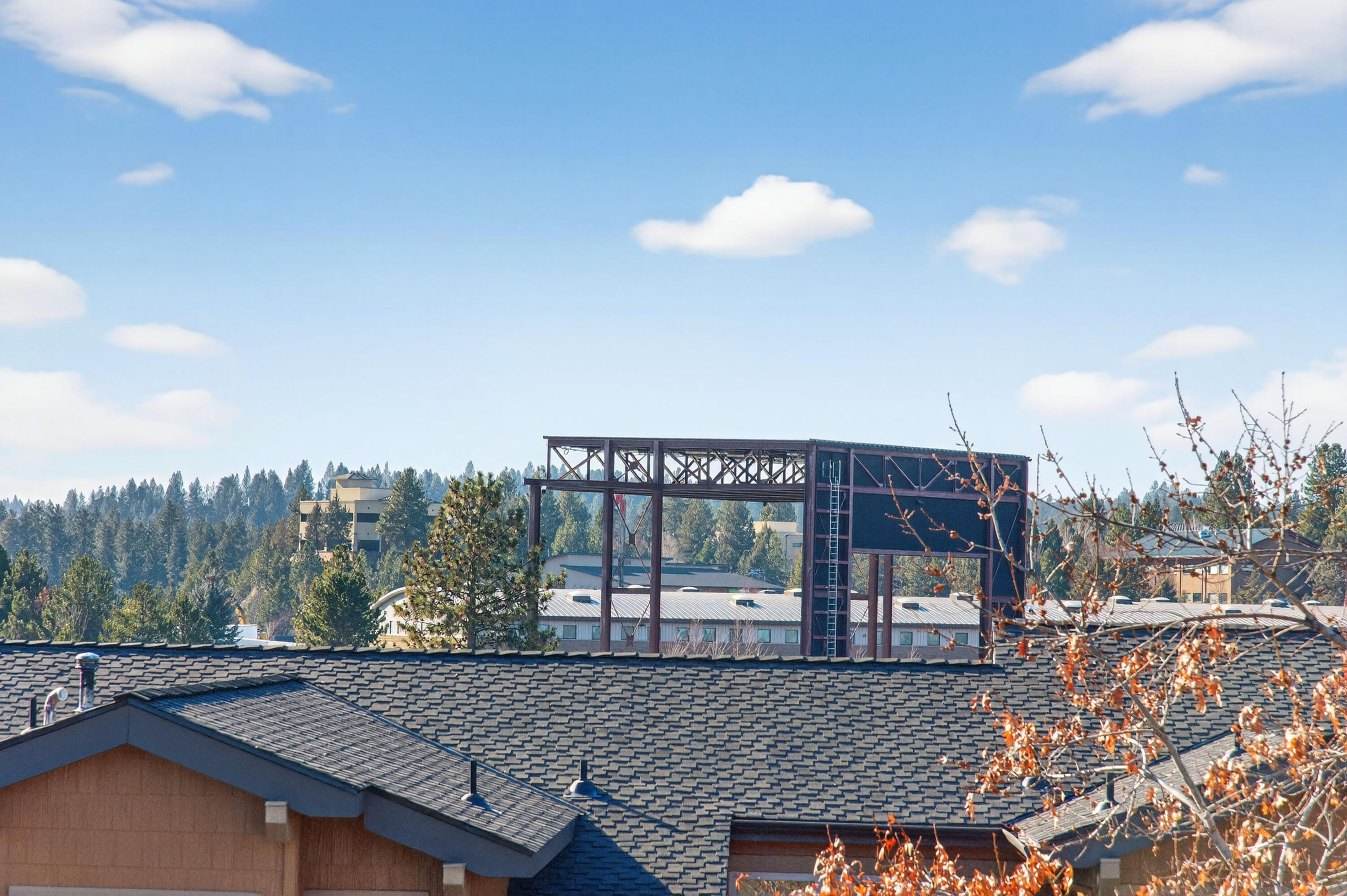680 Southwest Otter Way Bend, OR 97702 - Photo 47 of 48 a view of a roof deck with couches and wooden floor