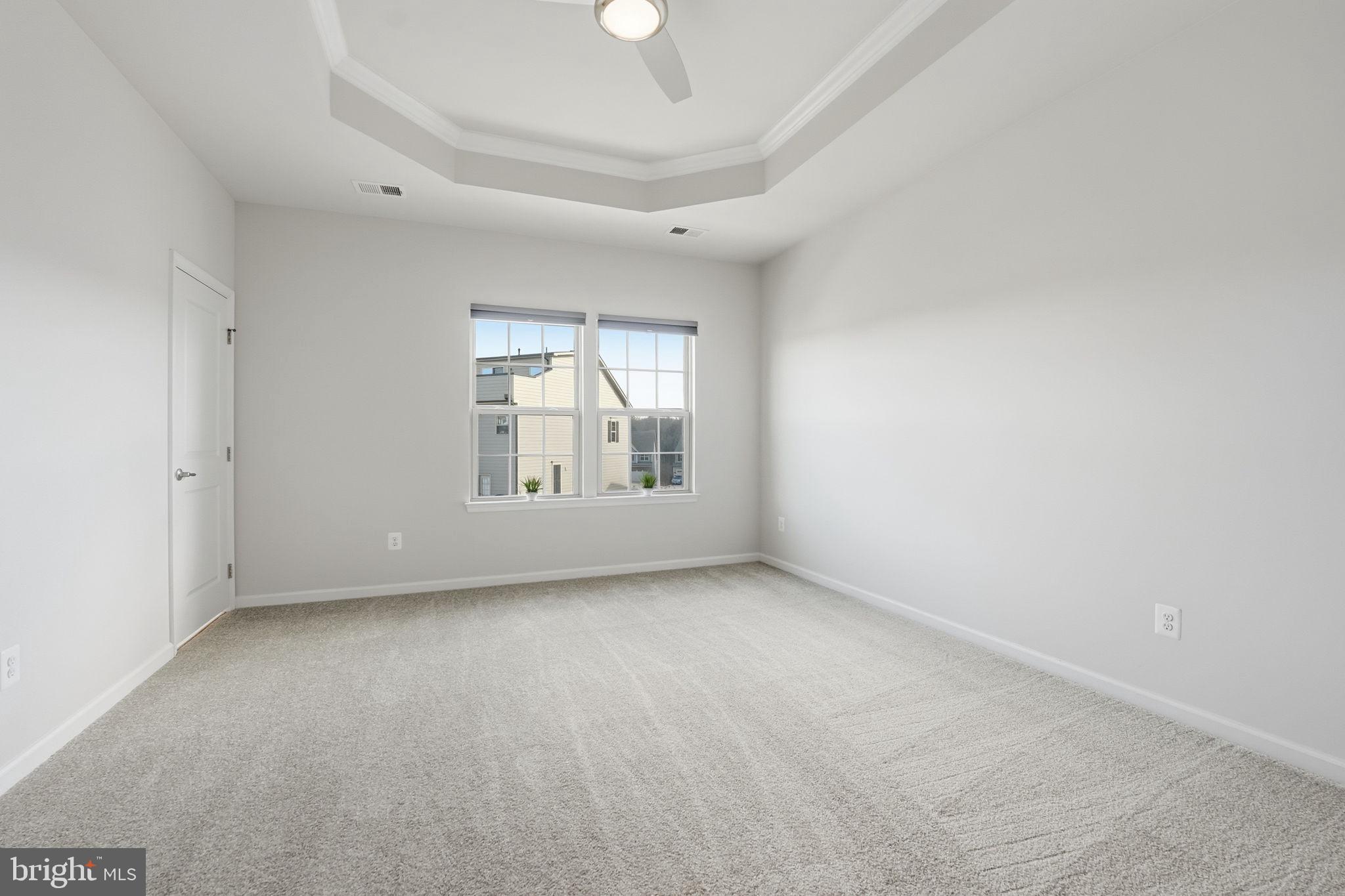 18179 Red Mulberry Road Dumfries, VA 22026 - Photo 11 of 58 an empty room with windows