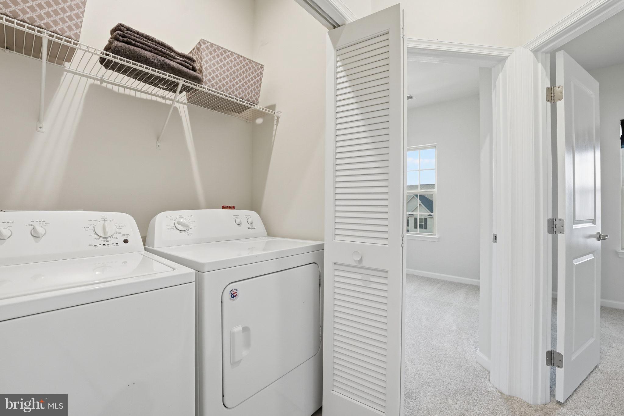18179 Red Mulberry Road Dumfries, VA 22026 - Photo 17 of 58 a utility room with dryer and washer