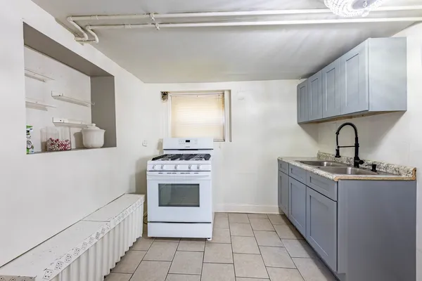 a view of a hallway with storage and utility