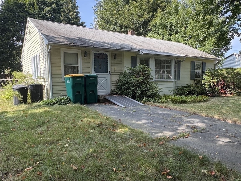 8 Boyd Road Woburn, MA 01801 - Photo 1 of 11 a view of a house with backyard and garden