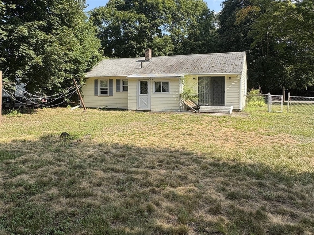 8 Boyd Road Woburn, MA 01801 - Photo 5 of 11 a view of a house with a yard