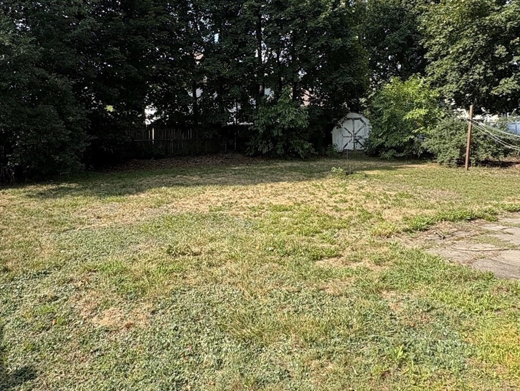 8 Boyd Road Woburn, MA 01801 - Photo 6 of 11 a view of backyard with green space