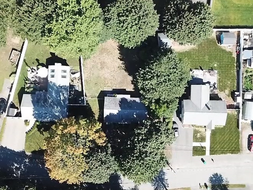 8 Boyd Road Woburn, MA 01801 - Photo 8 of 11 an aerial view of a house with a yard