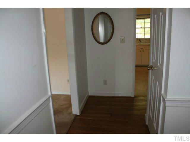 4817 Radcliff Road Raleigh, NC 27609 - Photo 3 of 20 Foyer has entrance to LR & kitchen and hallway towards the bedrooms.