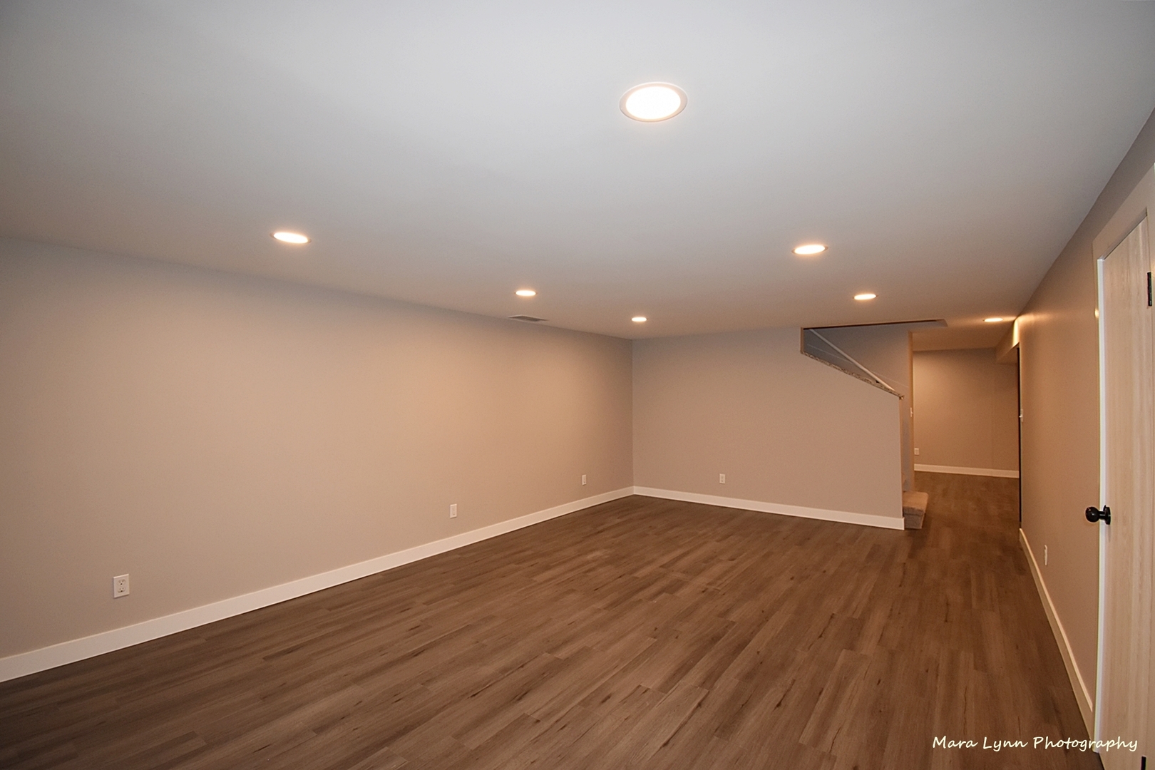 1470 South Tyler Road St. Charles, IL 60174 - Photo 23 of 37 a view of an empty room with wooden floor and a fan