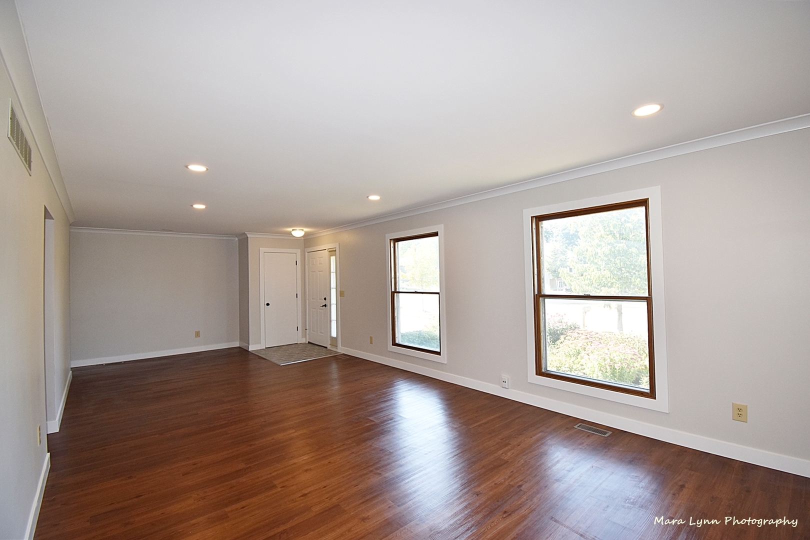 1470 South Tyler Road St. Charles, IL 60174 - Photo 6 of 37 an empty room with wooden floor and windows