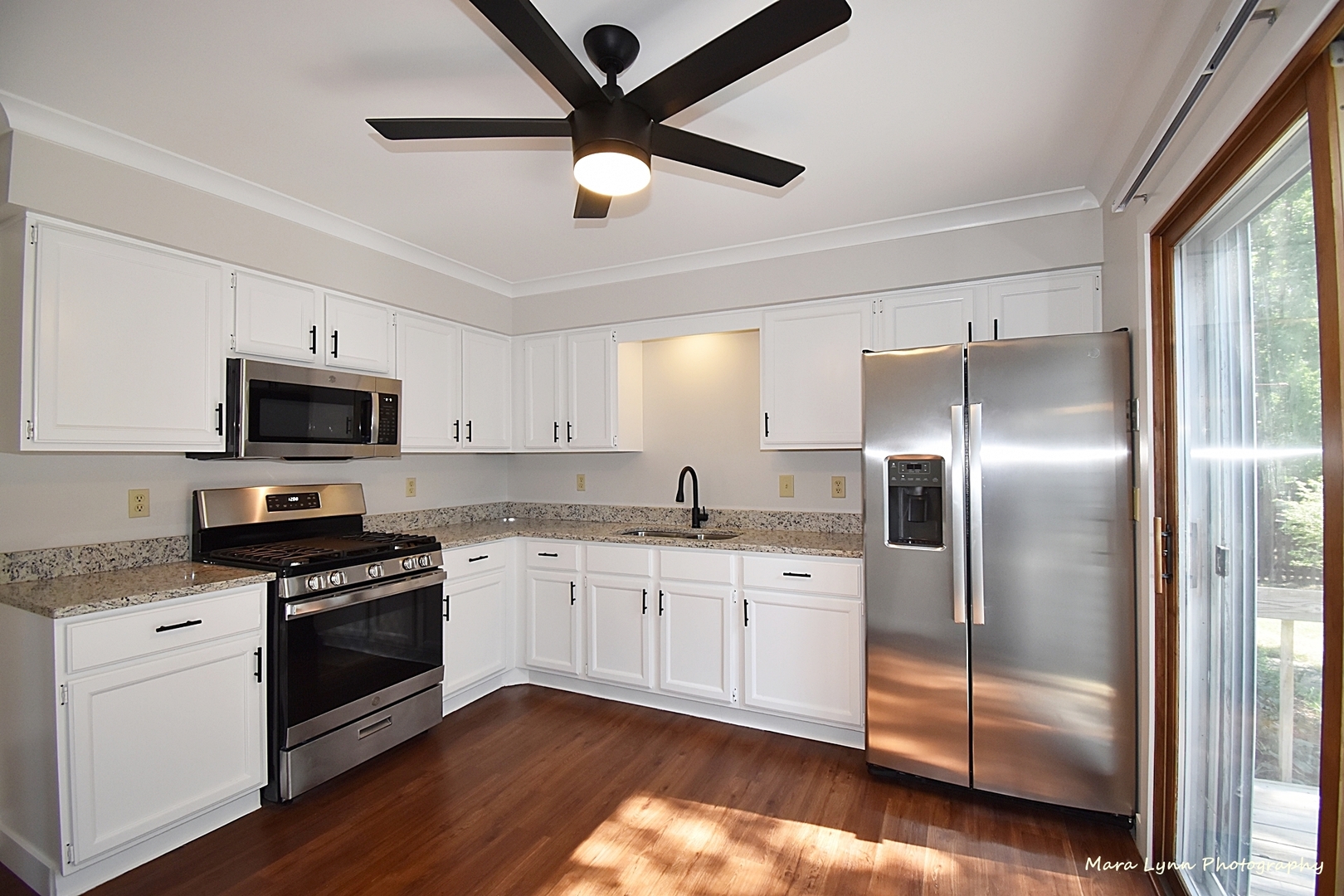 1470 South Tyler Road St. Charles, IL 60174 - Photo 8 of 37 a kitchen with stainless steel appliances granite countertop a stove a sink and a refrigerator