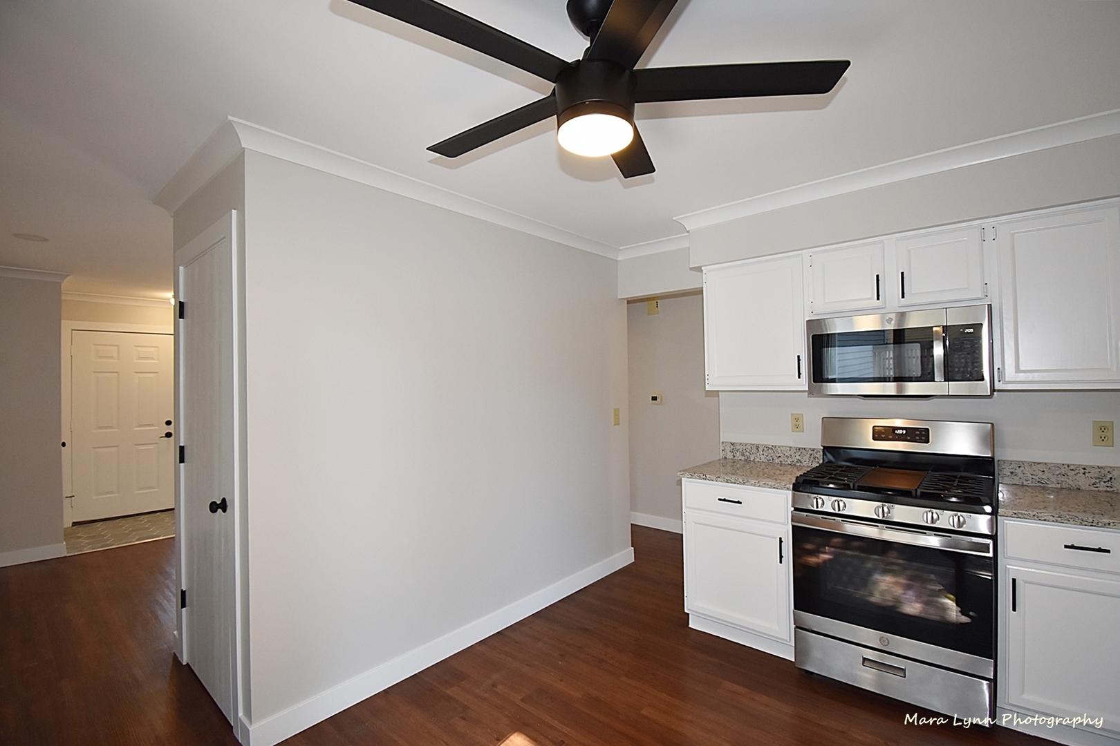 1470 South Tyler Road St. Charles, IL 60174 - Photo 9 of 37 a kitchen with stainless steel appliances a stove and a microwave