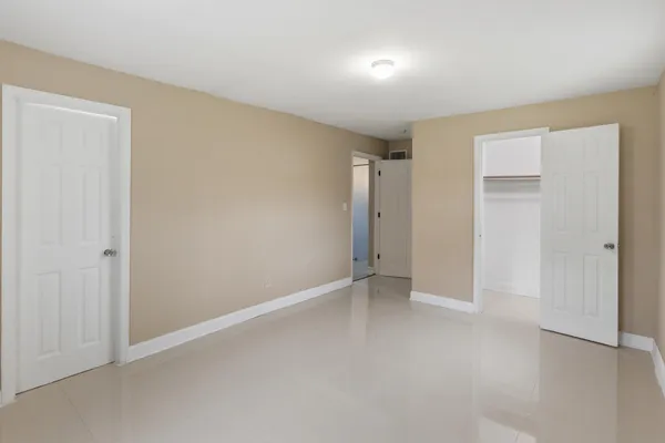 a bathroom with a toilet sink and shower