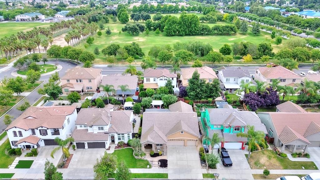 4152 Post Oak Drive Turlock, CA 95382 - Photo 58 of 71 an aerial view of residential houses with outdoor space and street view