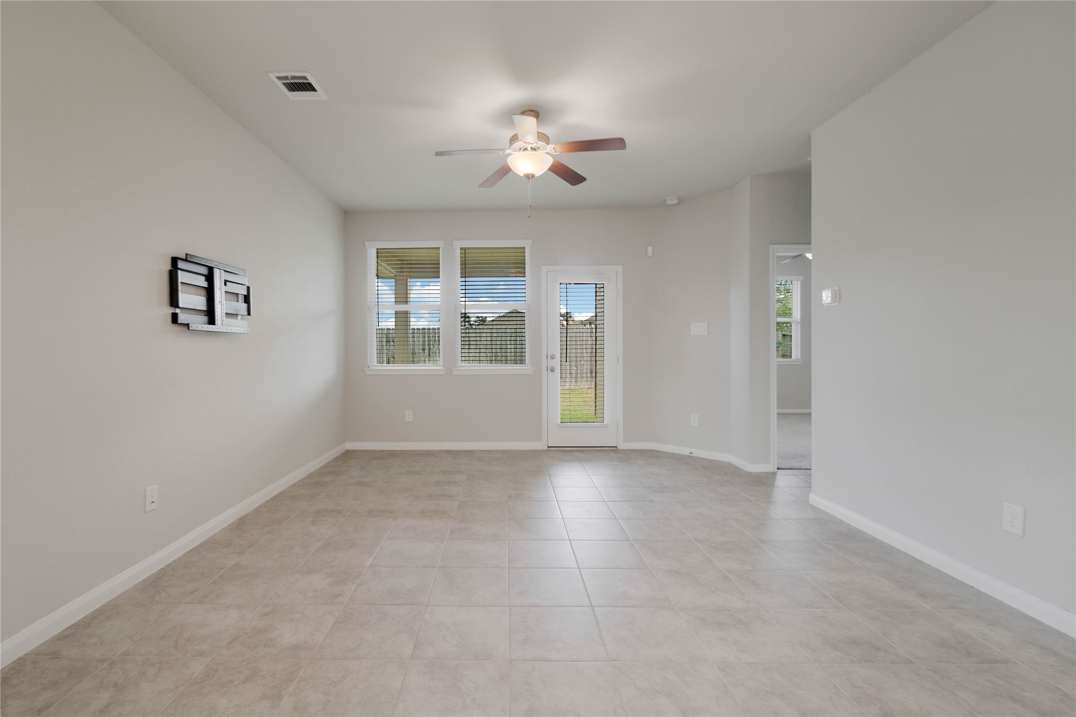 7080 Silverleaf Oak Street Conroe, TX 77304 - Photo 10 of 35 All the windows have blinds already installed. This home is ready for immediate move-in! There is even a wall-mount ready for your TV.