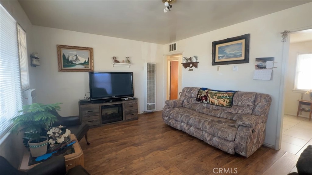 82038 5th Street Trona, CA 93562 - Photo 7 of 21 a living room with furniture and a flat screen tv