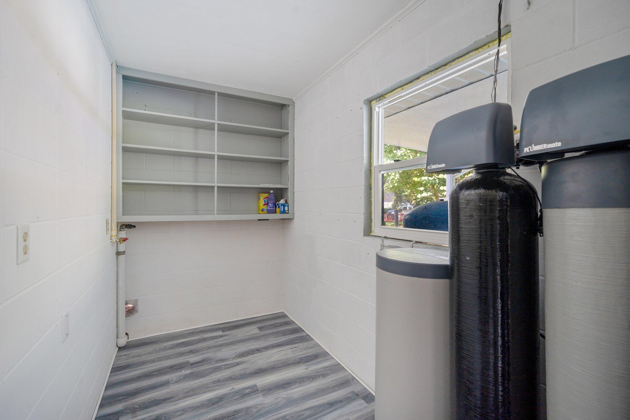 3411 Ranch Road Valrico, FL 33596 - Photo 20 of 28 a view of walk in closet with empty racks