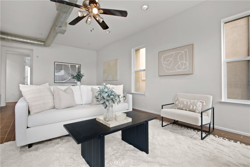 136 Soco Drive Fullerton, CA 92832 - Photo 11 of 35 a living room with furniture and a chandelier