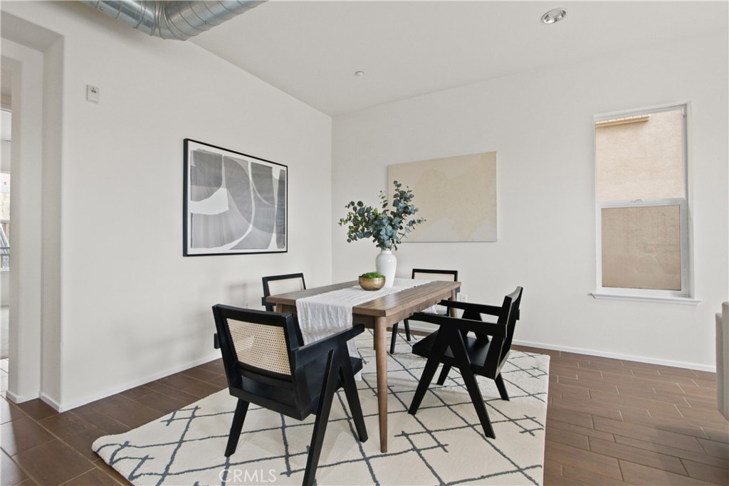 136 Soco Drive Fullerton, CA 92832 - Photo 14 of 35 a view of a dining room with furniture and wooden floor
