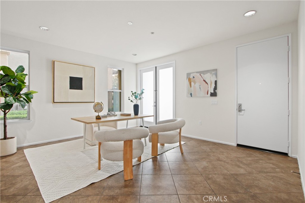 136 Soco Drive Fullerton, CA 92832 - Photo 4 of 35 a workspace with furniture and window