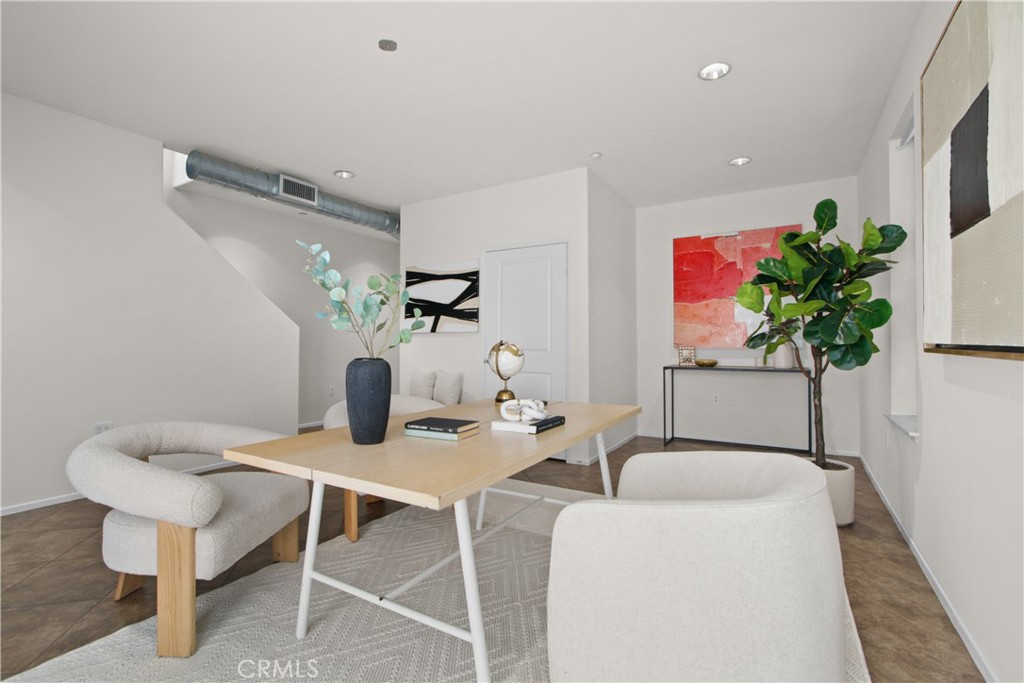 136 Soco Drive Fullerton, CA 92832 - Photo 6 of 35 a view of a dining room with furniture and a potted plant