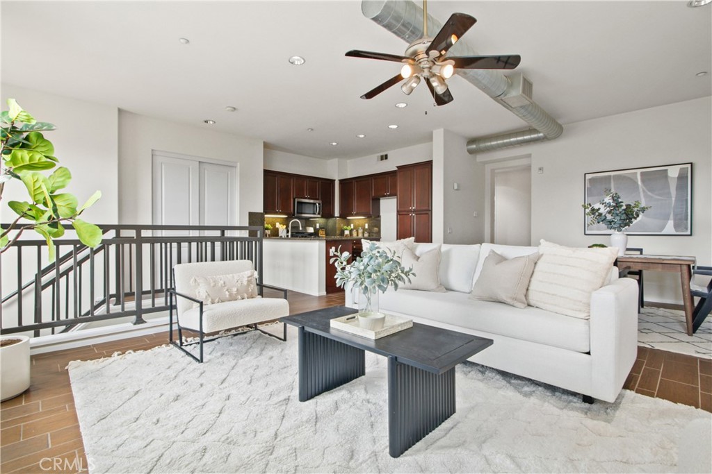136 Soco Drive Fullerton, CA 92832 - Photo 8 of 35 a living room with furniture and a wooden floor