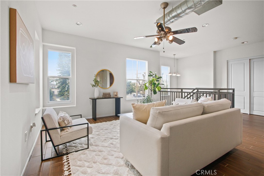 136 Soco Drive Fullerton, CA 92832 - Photo 10 of 35 a living room with furniture and a chandelier