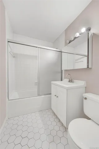 a view of swimming pool with a balcony