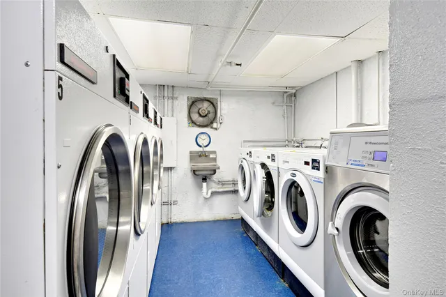 a view of parking garage with cars parked
