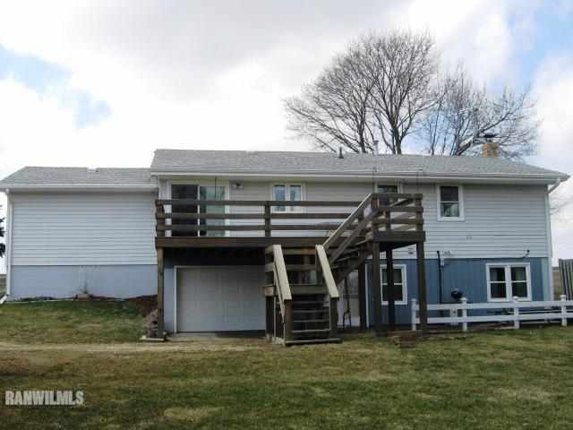 1275 South Bolton Road Freeport, IL 61032 - Photo 3 of 12 a front view of a house with a yard