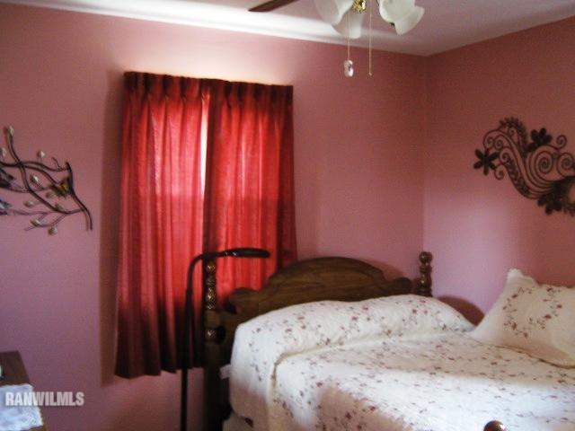 1275 South Bolton Road Freeport, IL 61032 - Photo 9 of 12 a bedroom with a bed and a window