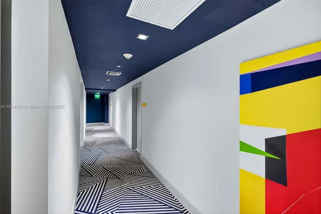 a workspace with furniture and wooden floor