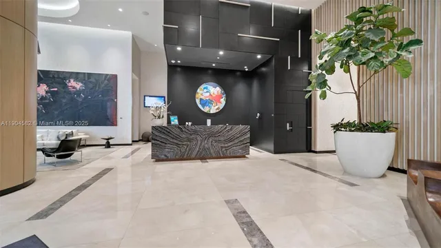 a front view of a house with a garden and patio