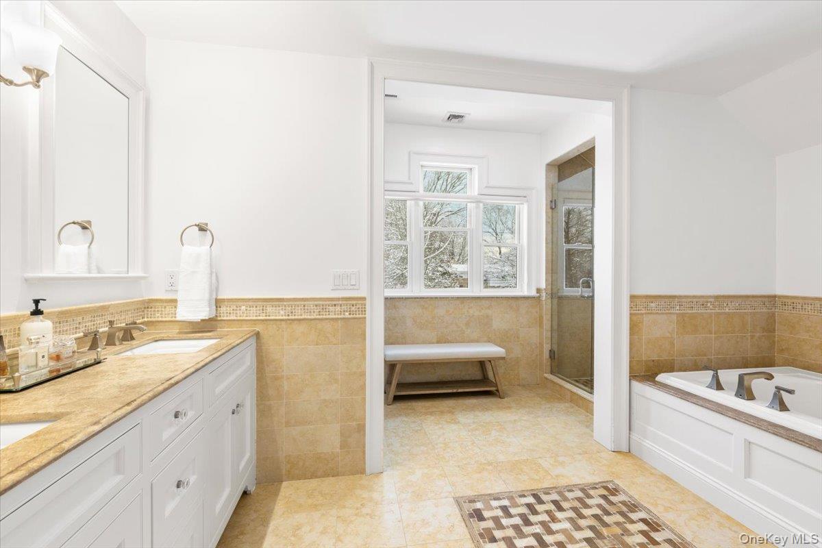 14 Eagles Bluff Rye Brook, NY 10573 - Photo 26 of 48 Primary bathroom with double sink, shower and jacuzzi