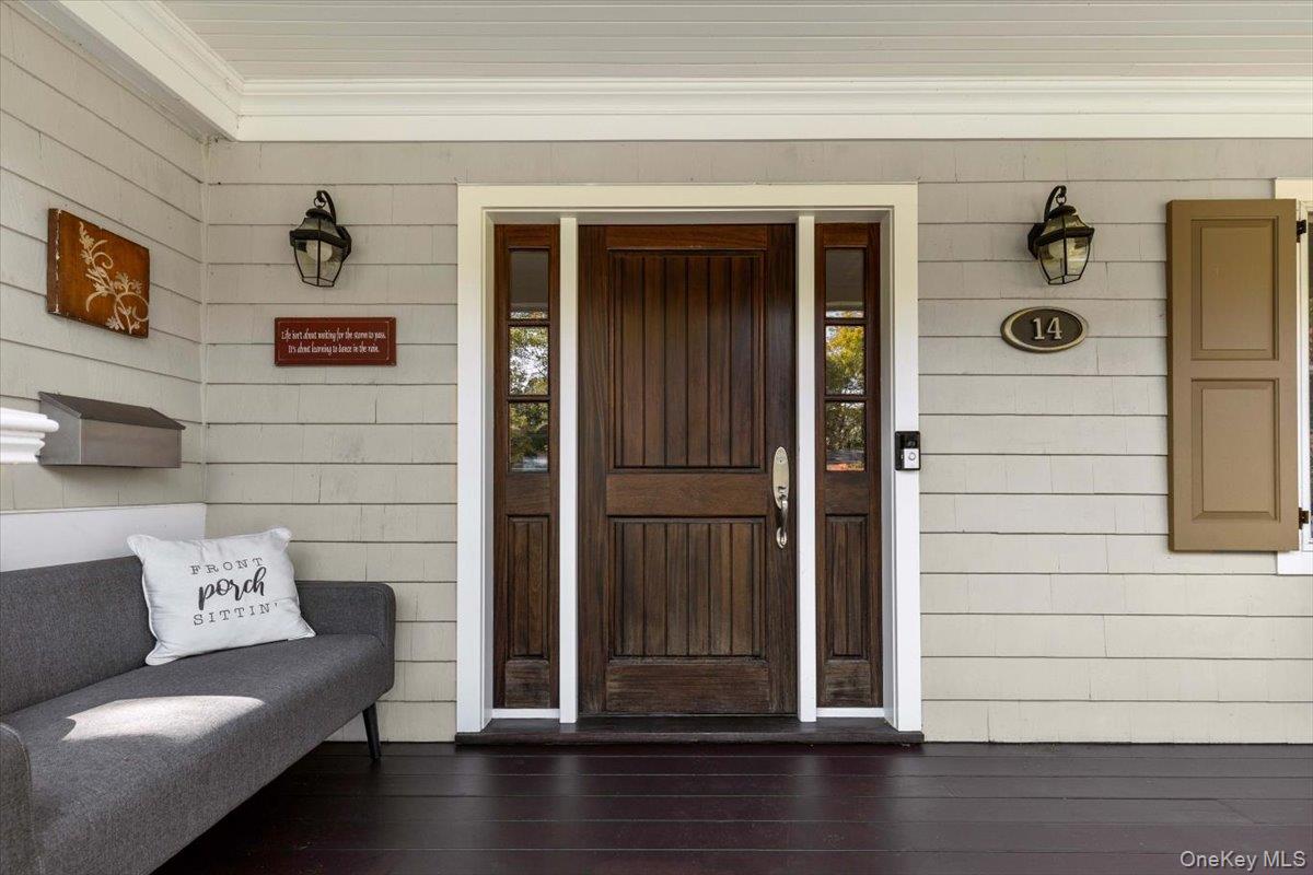 14 Eagles Bluff Rye Brook, NY 10573 - Photo 3 of 48 Great mahogany porch, perfect to enjoy the view of the cul de sac, kids playing in the circle or a summer storm